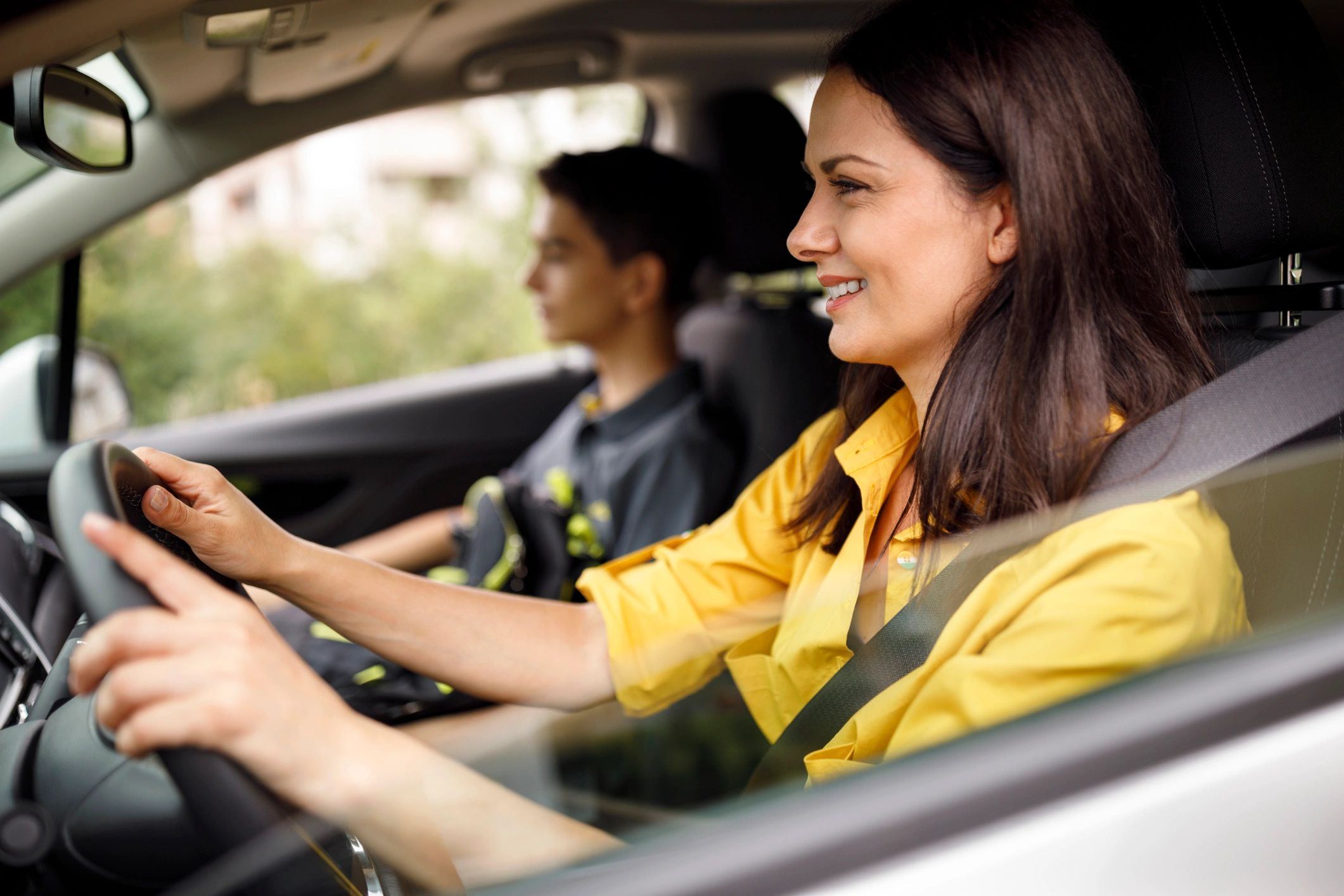 teen driver learning with parent at home